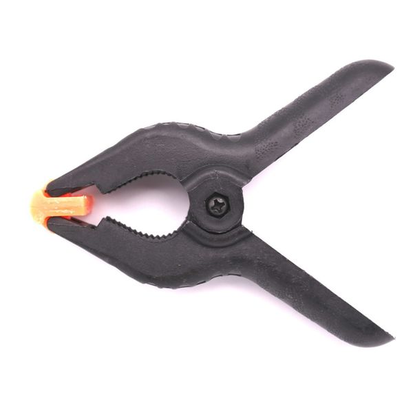 Caruba Hintergrundklemme  Schwarz/Orange Groß (2 Stück)