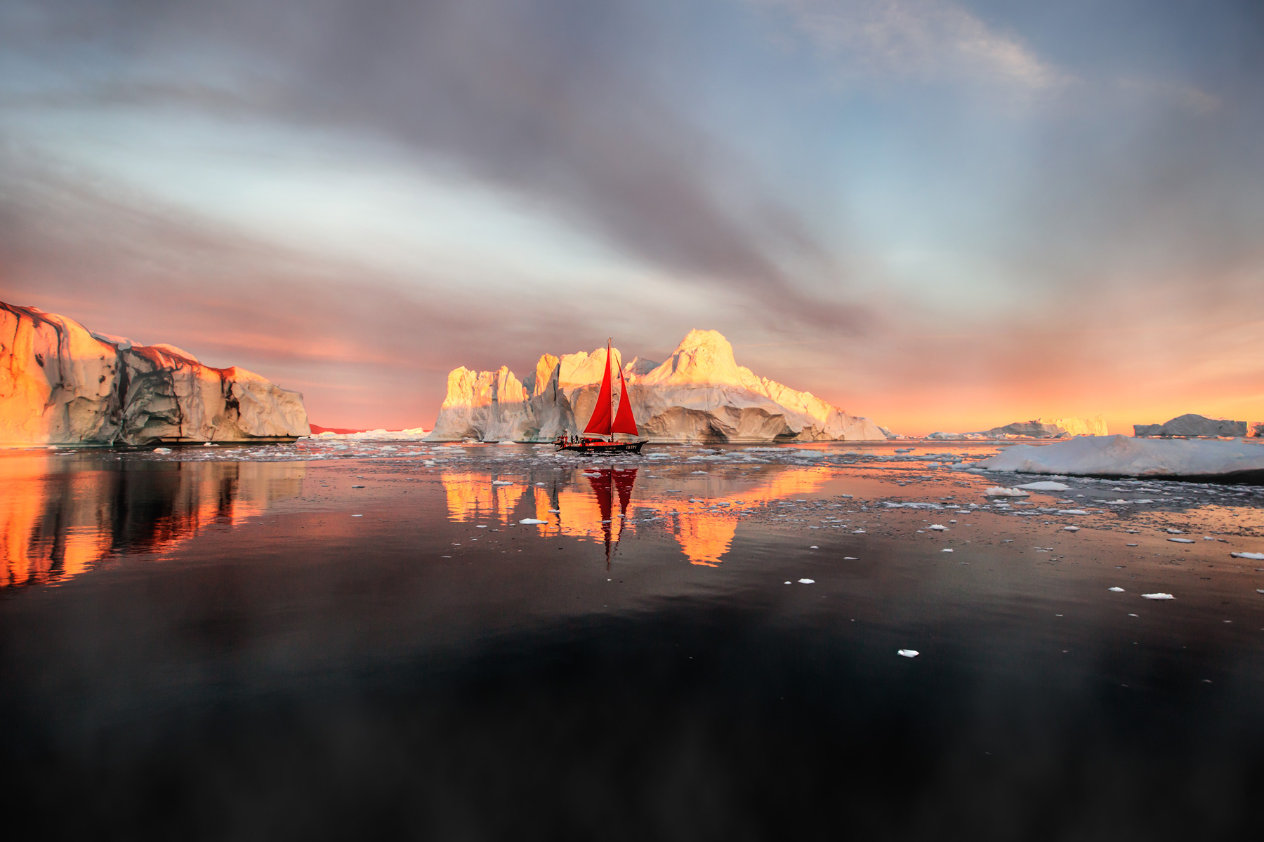 Grönland Segelboot im Sonnenuntergang Eisberg